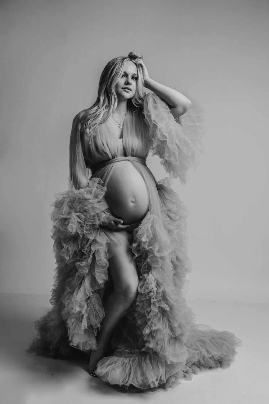 Full-length maternity portrait in flowing ruffled tulle robe, Boise maternity photos